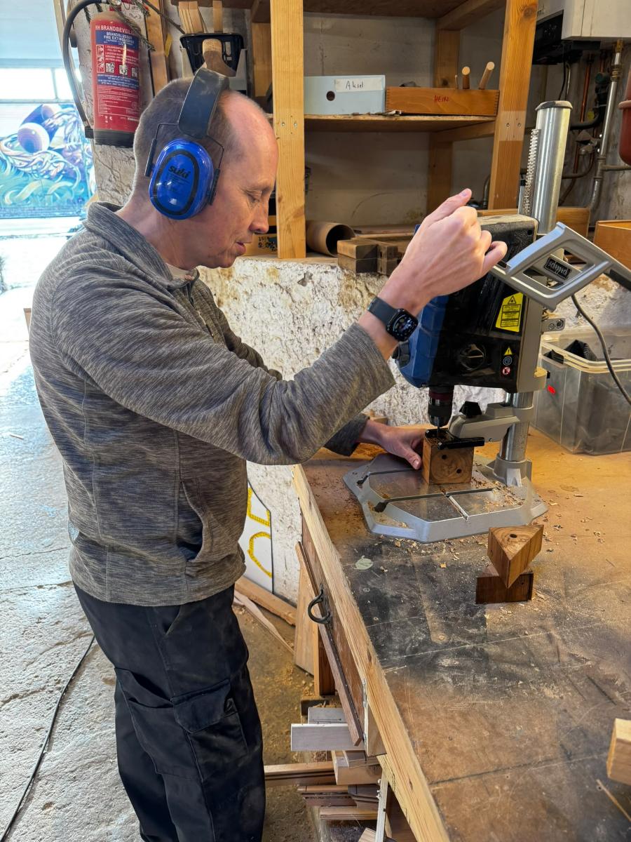 Drilling a part in the workshop